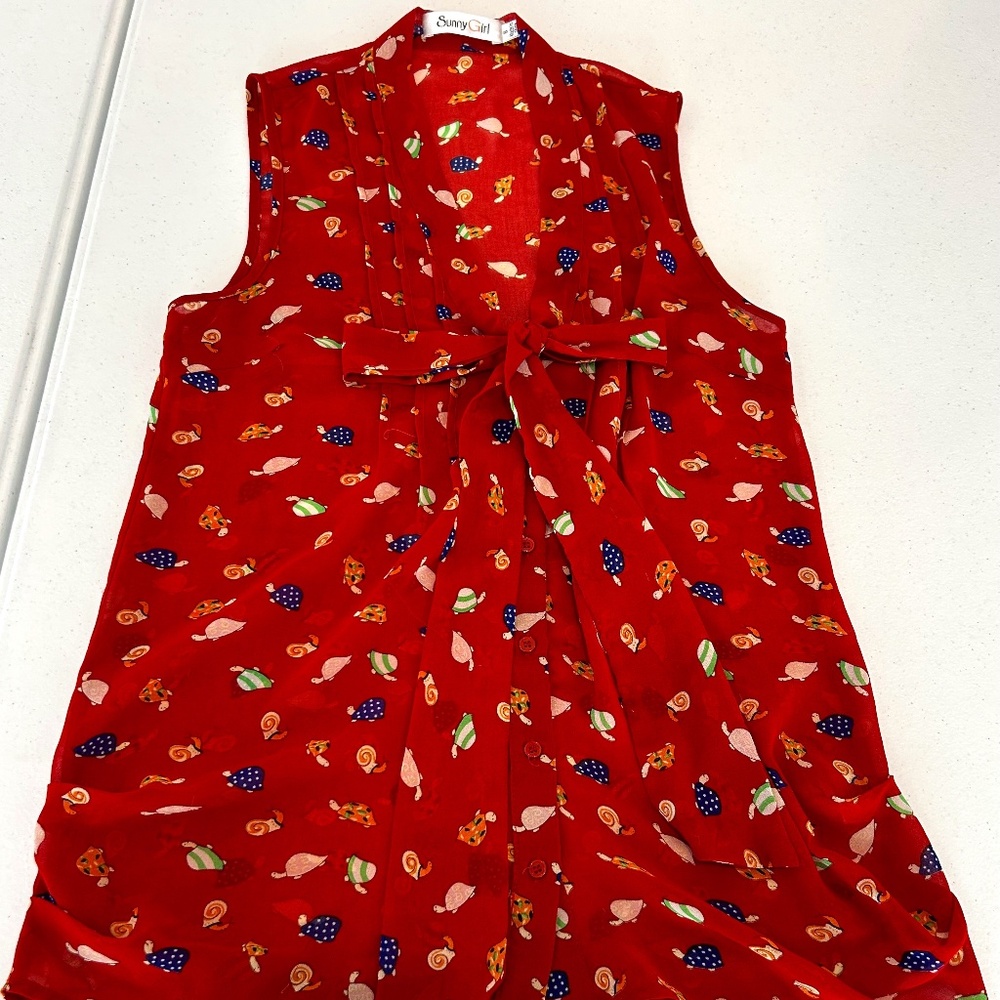 Really cute turtle and snail themed sleeveless top by Sunny Girl